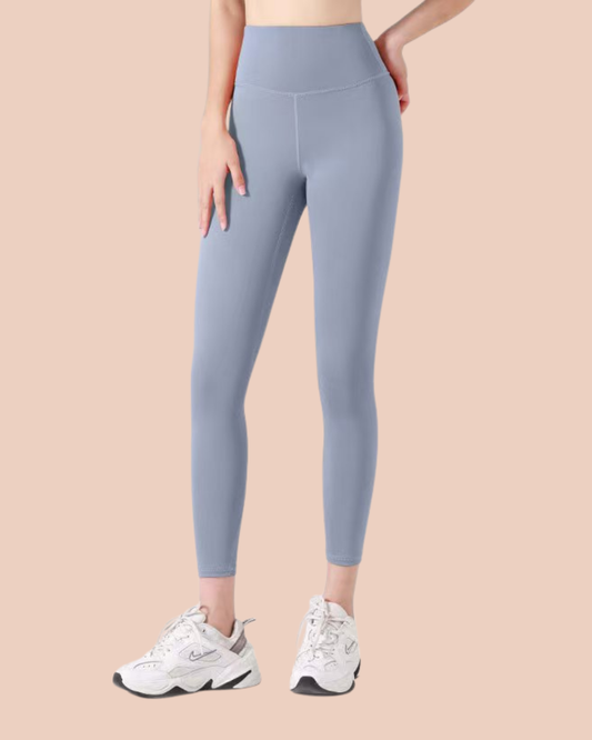 High-waist seamless workout leggings worn by a model, gym and yoga wear, SHAPE