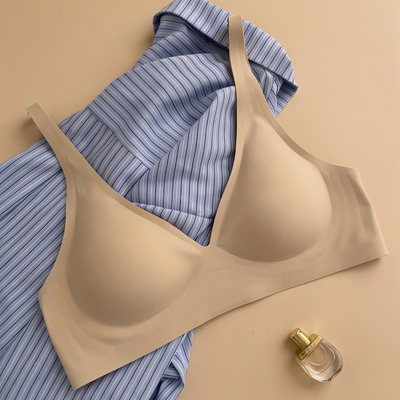 Plunge Lite Bra in Beige, worn by a model — SHAPE Lingerie