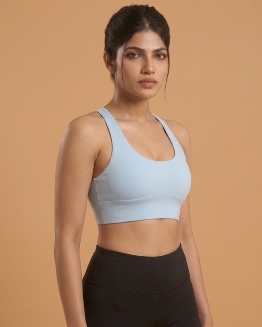 Power Sculpt Sports Bra in Sky Blue, side view, worn by a model, SHAPE Lingerie
