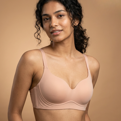 Seamless T-Shirt Bra in Beige, worn by a model, front view — SHAPE Lingerie