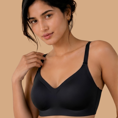 Signature Seamless Bra in Black, worn by a model — SHAPE Lingerie