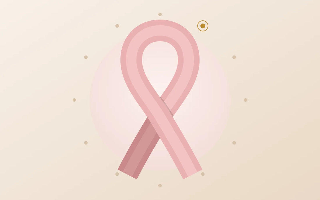 The Breast Health Hub ribbon: a pink breast health awareness ribbon inside a ring of twelve dots, one for each month. Artwork by SHAPE
