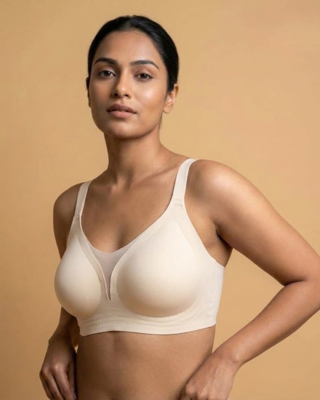 VLite Seamless Bra in beige worn by a model, front view