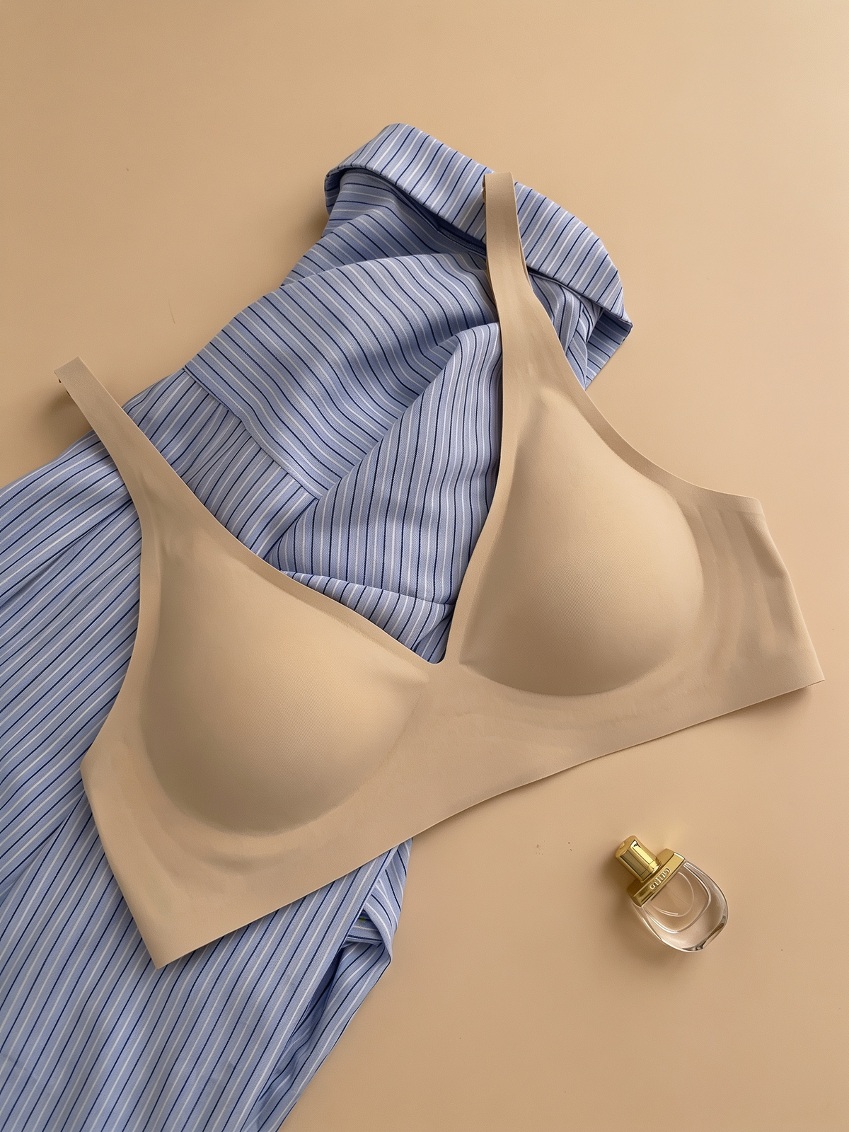 Plunge Lite Bra in Beige, worn by a model — SHAPE Lingerie