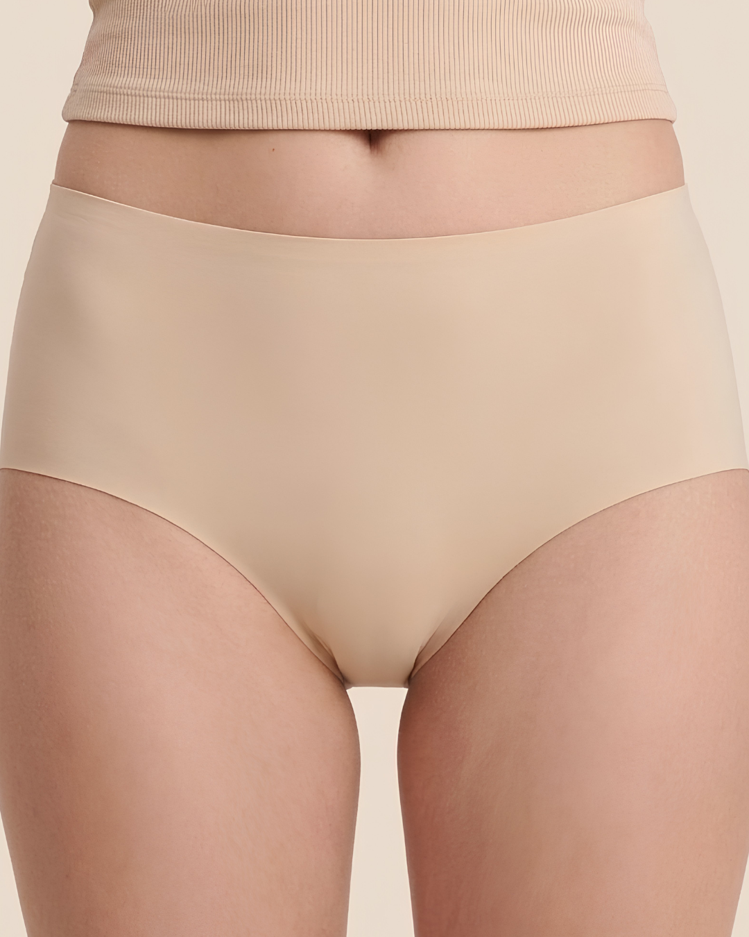 Seamless Panties in Beige, front view, worn by a model — SHAPE Lingerie