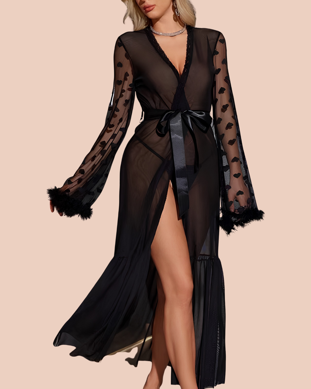 Noir sheer lace robe in black with heart-lace trim, feather cuffs and satin tie waist, worn by a model, SHAPE
