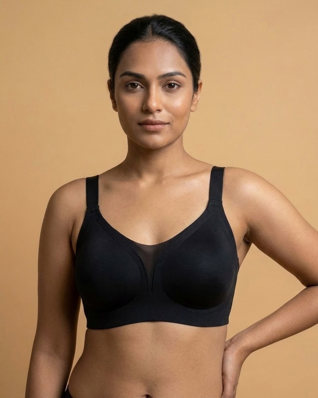 VLite Seamless Bra in Midnight Black worn by a model, front view, SHAPE Lingerie